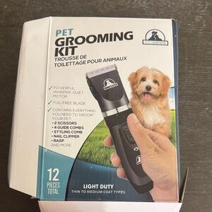Never used but opened box & missed one scissor. Black Pet Grooming Kit